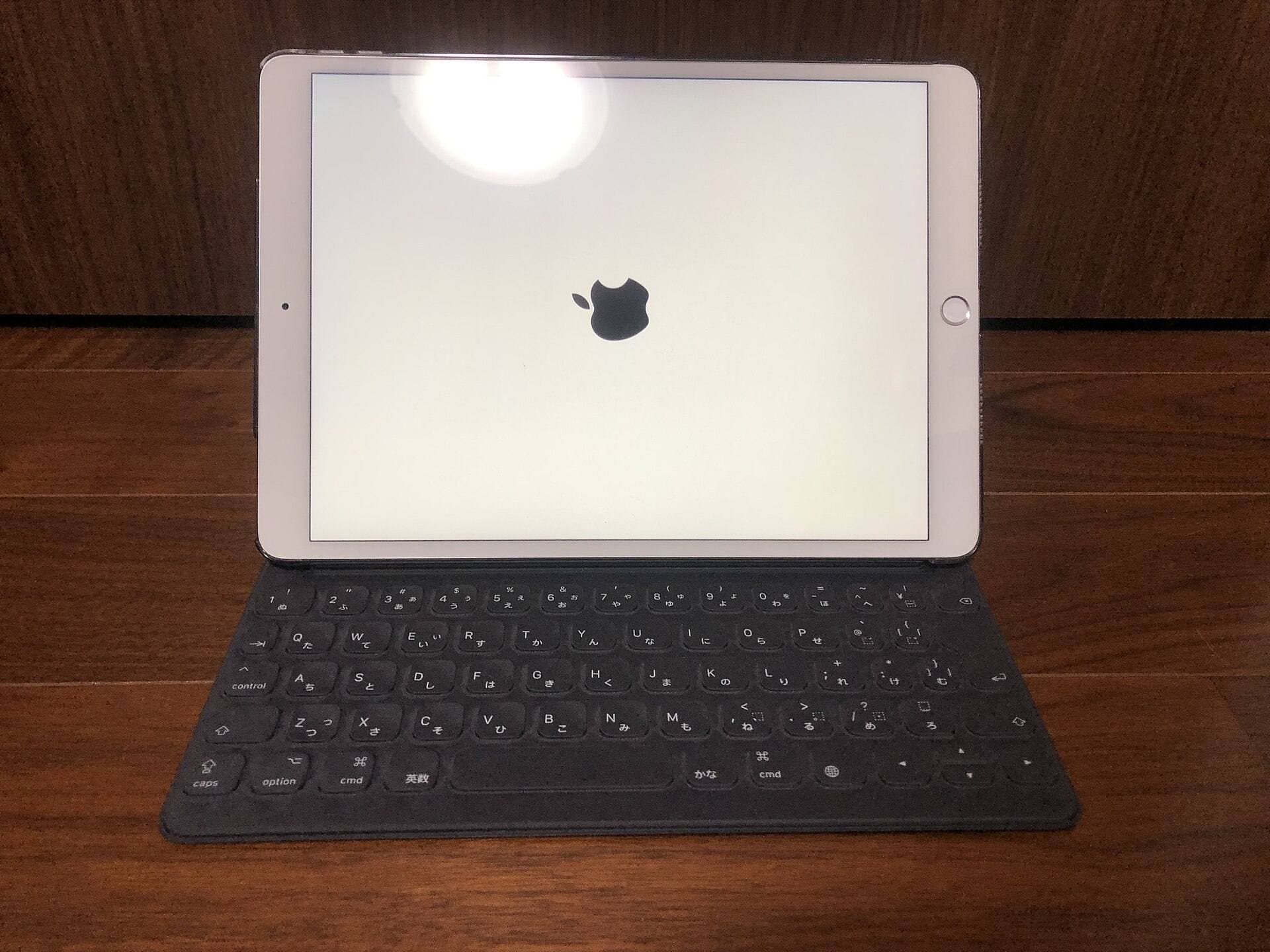 Compact iPad setup with charging access visible