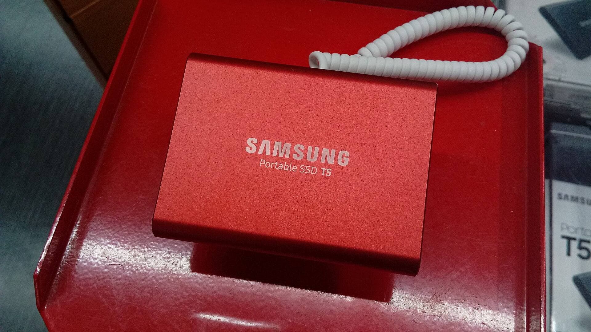 Portable SSD and card reader kit on work desk