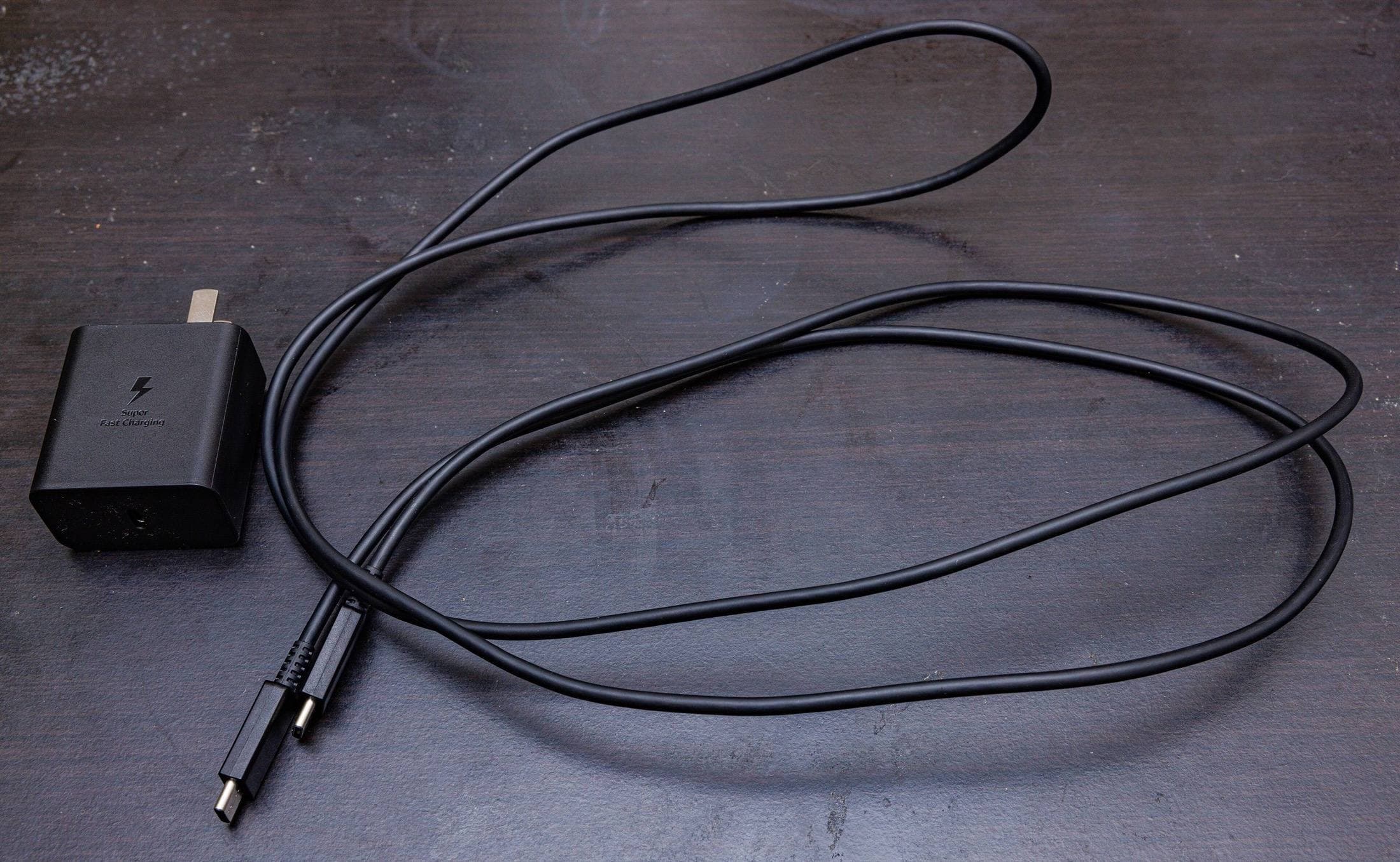 Compact USB-C wall charger on desk