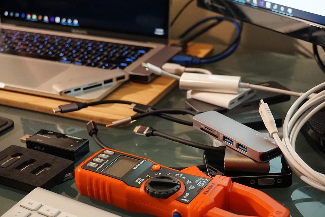 USB-C hub and adapter side-by-side on desk