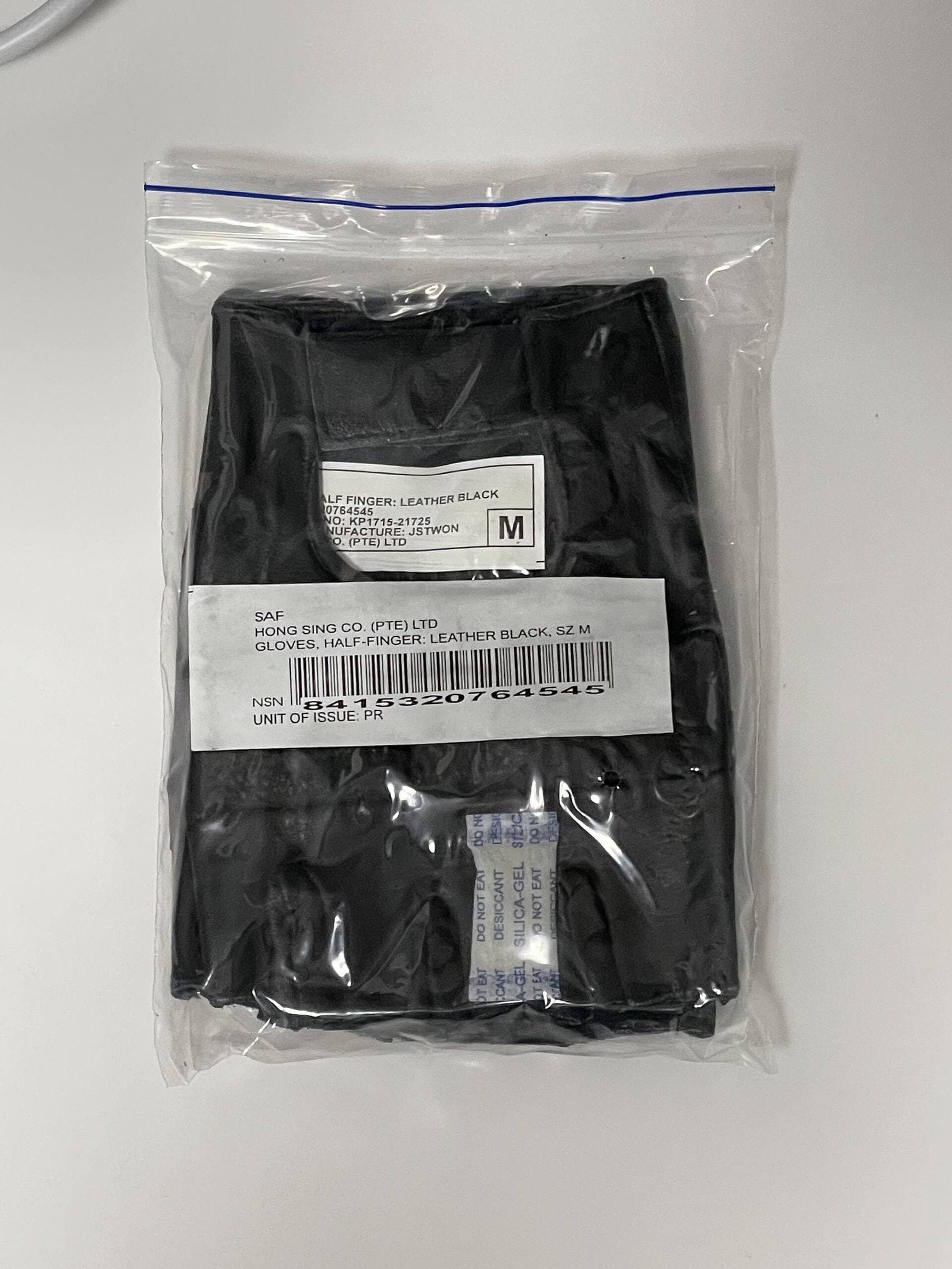 Half-finger gloves in packaging